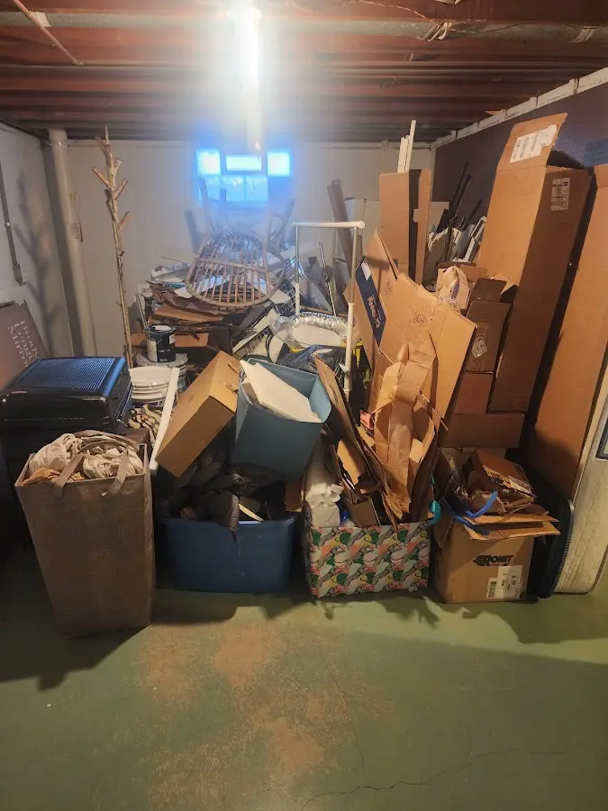 Roll-off dumpster container at job site for Construction Dumpster Rental in Bradford